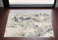 2' X 3' Blue and Beige Abstract Area Rug