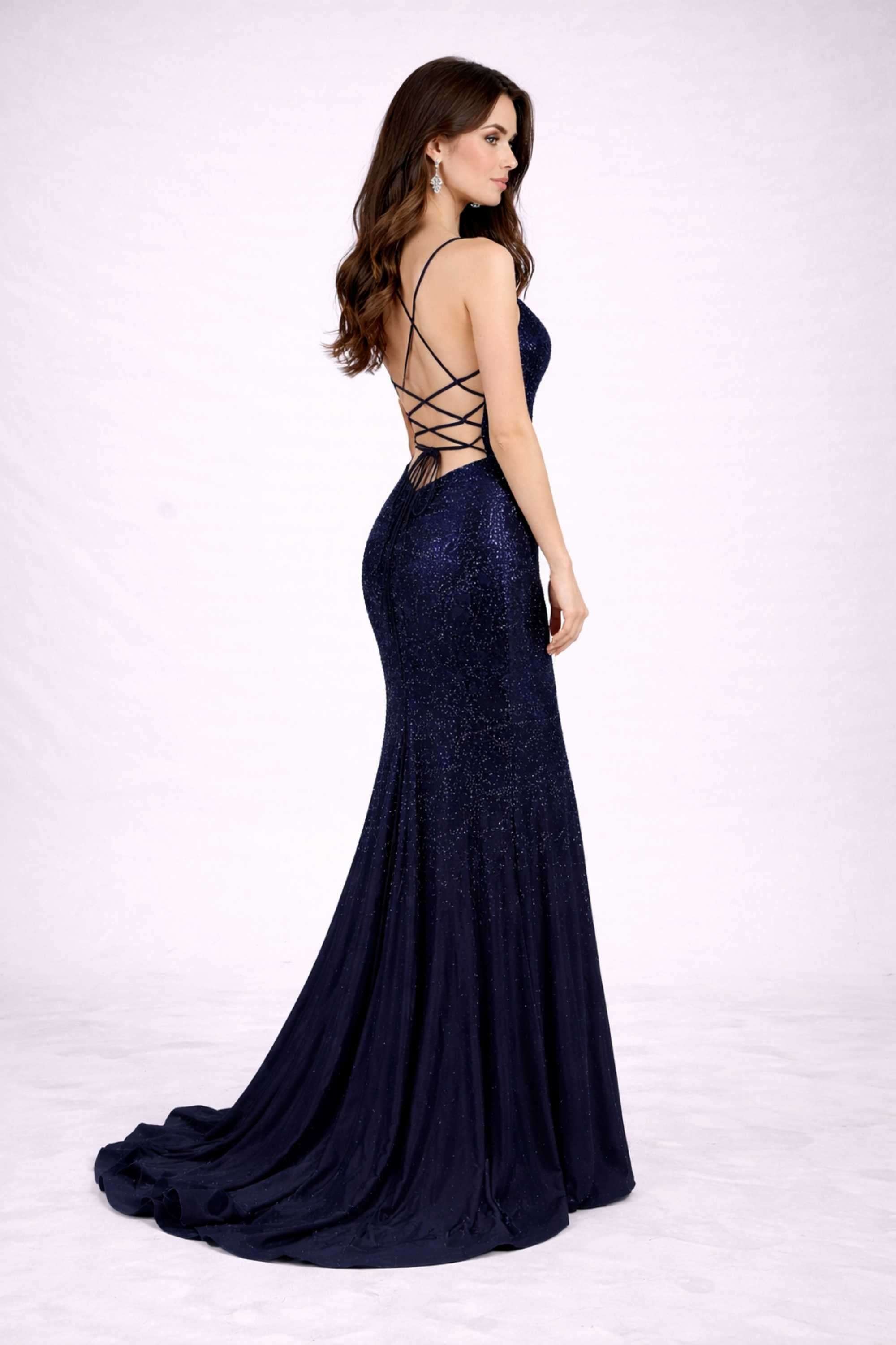 Poppy Navy Rhinestone Long Prom Dress by Jessica Stuart with lace-up back and mermaid silhouette, perfect for red carpet or prom events.