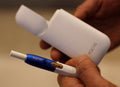 F.D.A. Panel Rejects Philip Morris' Claim That Tobacco Stick Is Safer Than  Cigarettes
