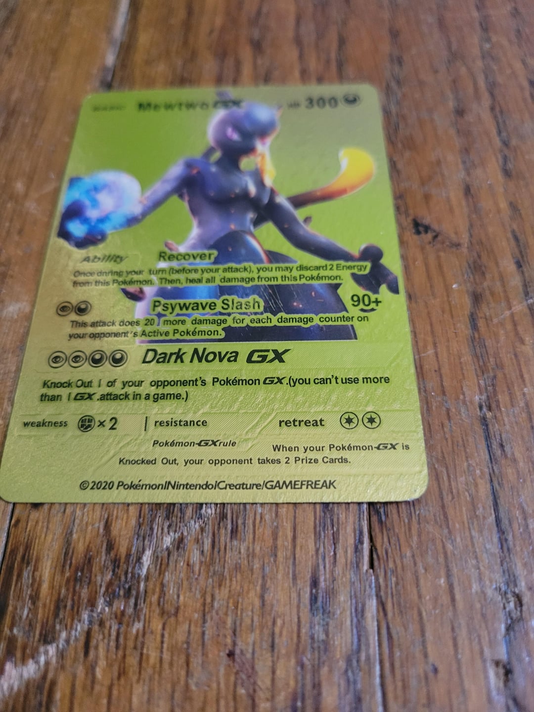 My Golden Mewtwo GX card has a typo; it says dnring instead of during on  the ability description. I did some research and found a few other cards  like this, some say